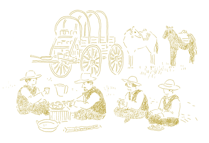 チャックワゴンの近くで食事をする4人